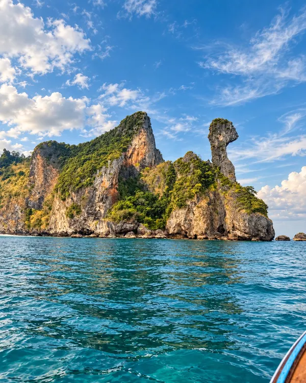 Chicken Island's limestone peak seen from the longtail boat