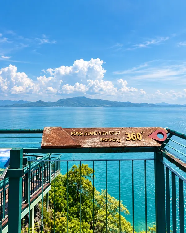 The Hong Island 360° viewpoint sign above the sea and distant islands